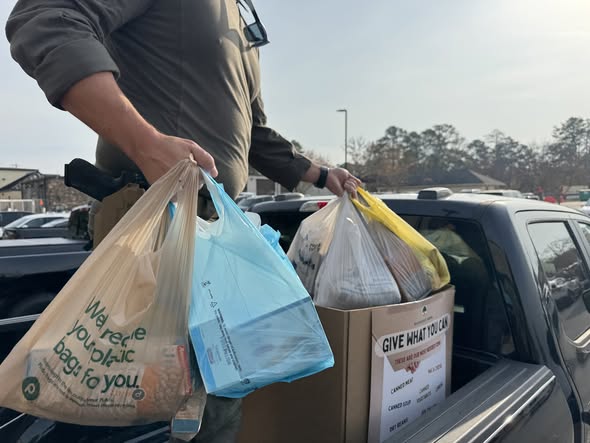 Loading bags and boxes onto truck